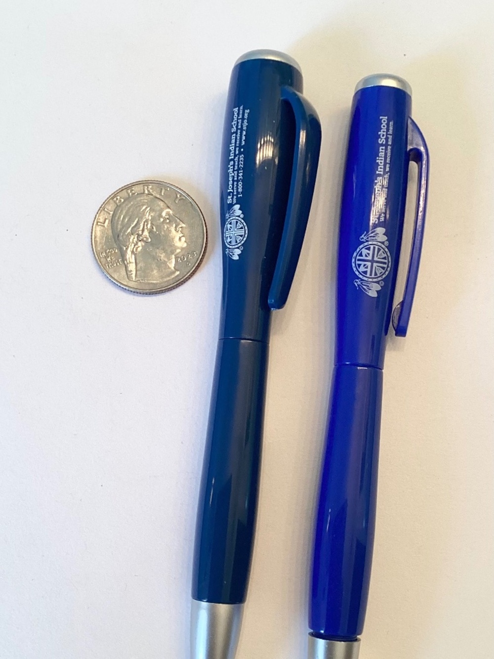 Blue … two FLASHLITE PENS, writes in smooth blue ink